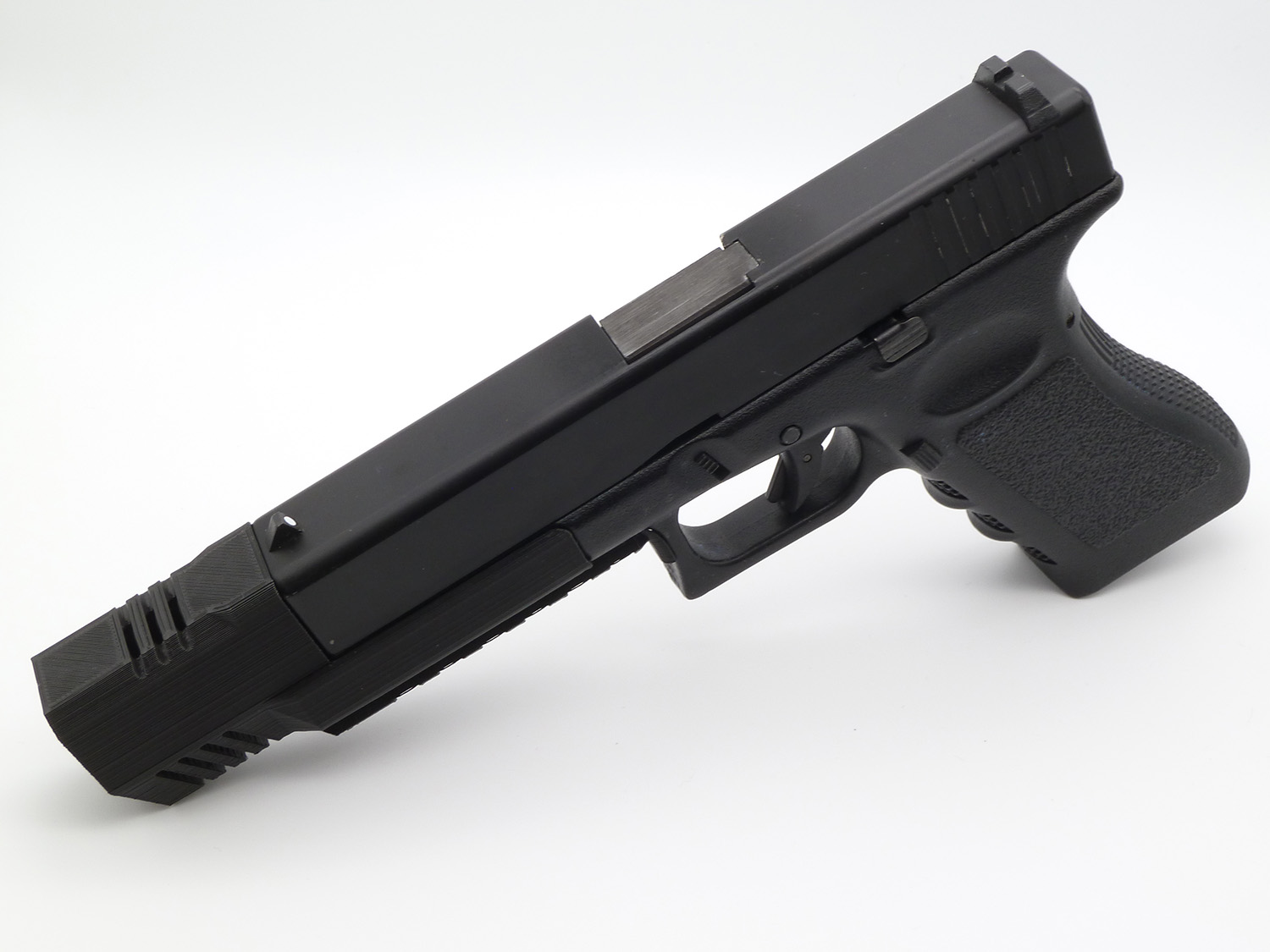 Glock 17/18 Short Muzzle Break, attached to an ASG Glock 17 (Glock not included!)