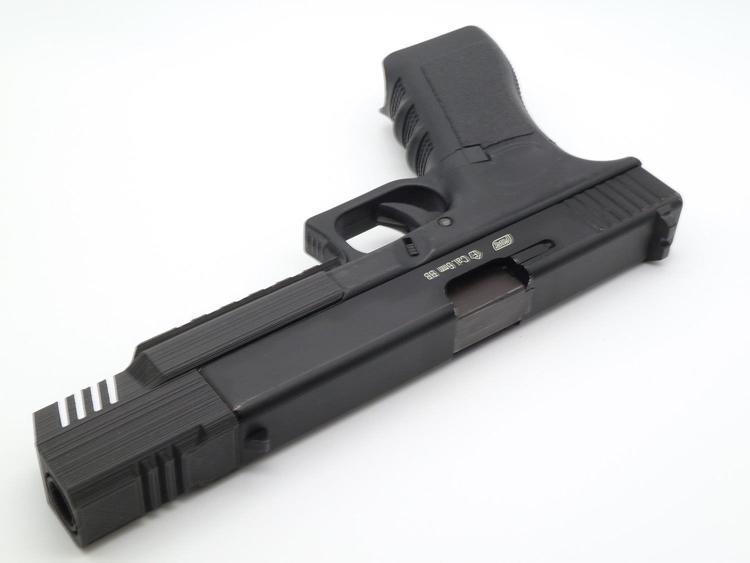 Glock 17/18 Short Muzzle Break, attached to an ASG Glock 17 (Glock not included!)