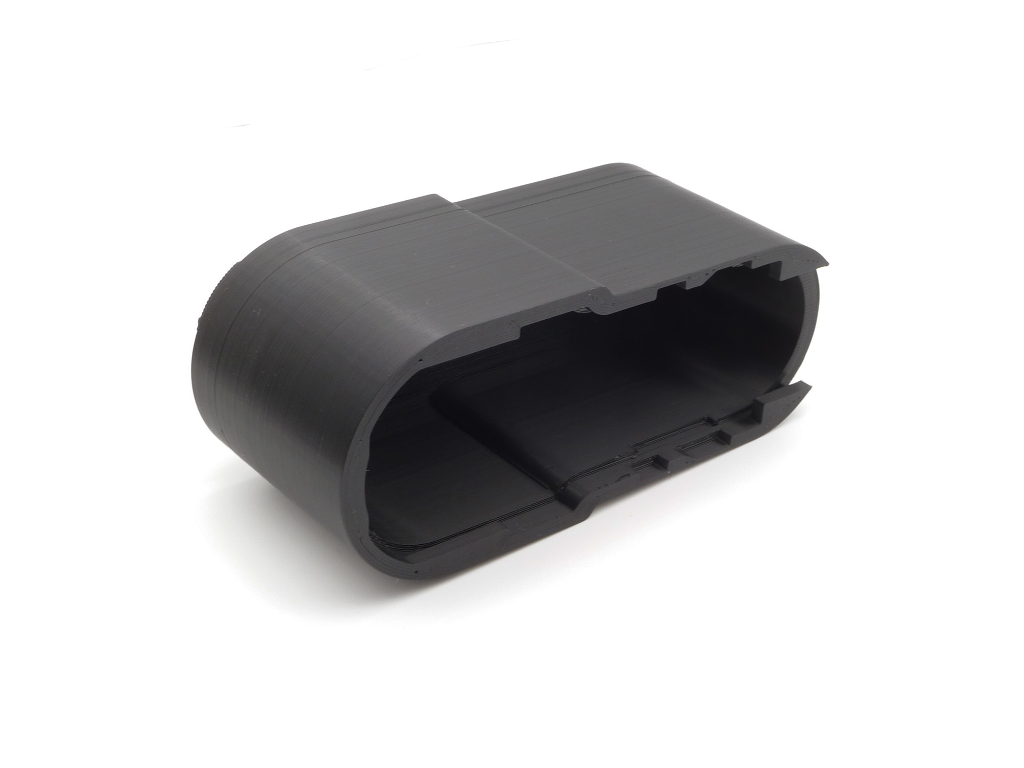 The buttstock extension on it's side, showing the inside of the compartment