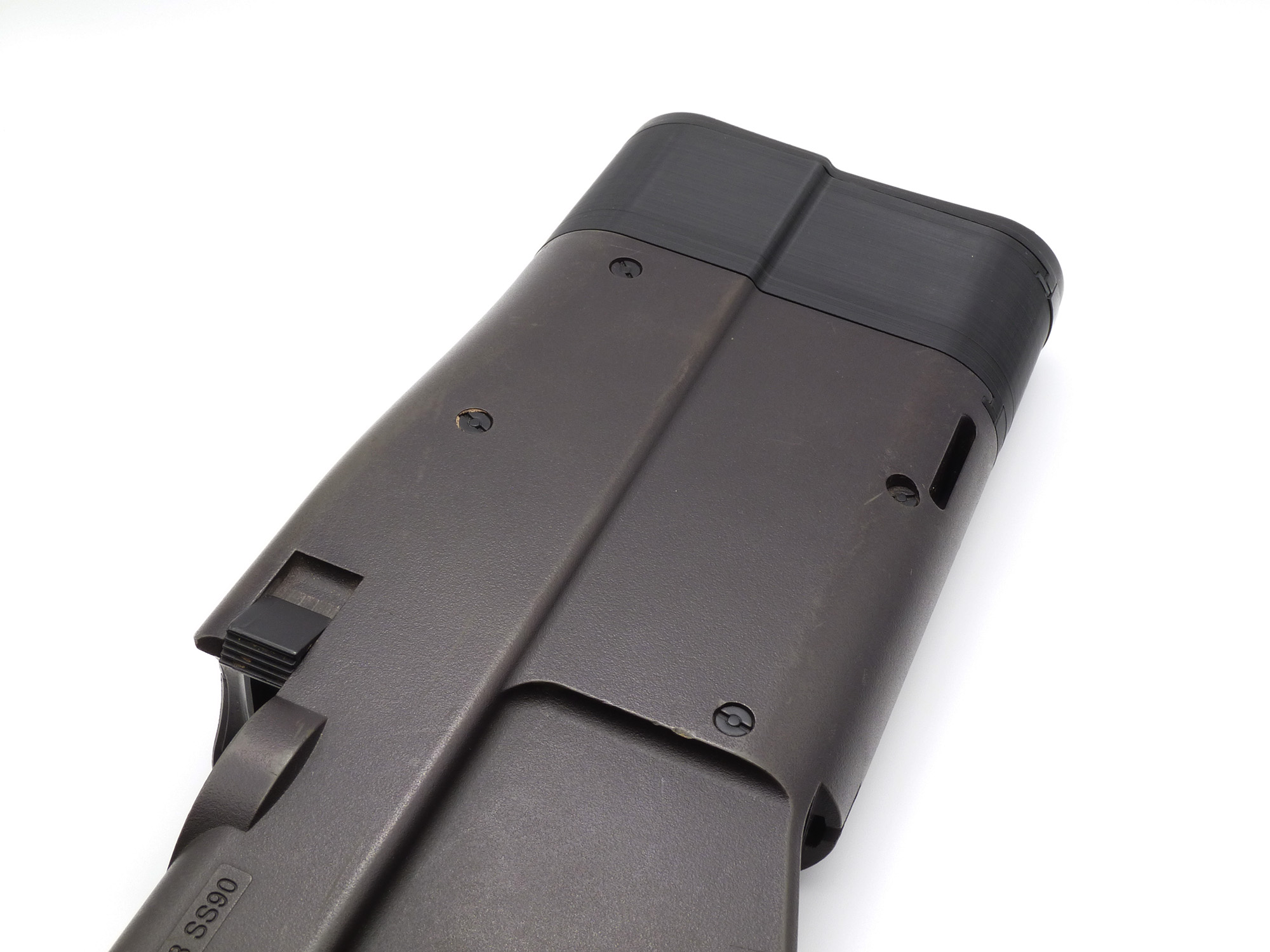Showcasing how the unit looks when attached to a Tokyo Marui P90