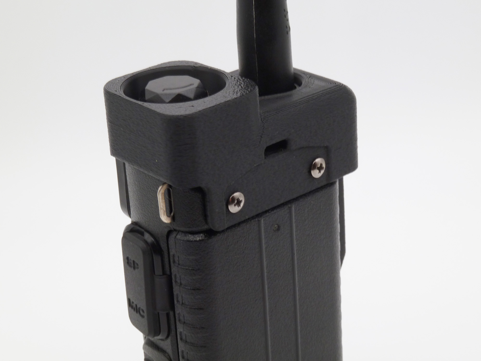In-use, attached to a battle belt